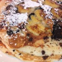 Oreo Dream Pancakes (3) · Filled with oreo cookie crumbs, sliced bananas and chocolate chips. Topped with powder sugar...