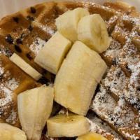 Chunky Monkey Waffle · Stuffed with walnuts, chocolate chips and topped with bananas.