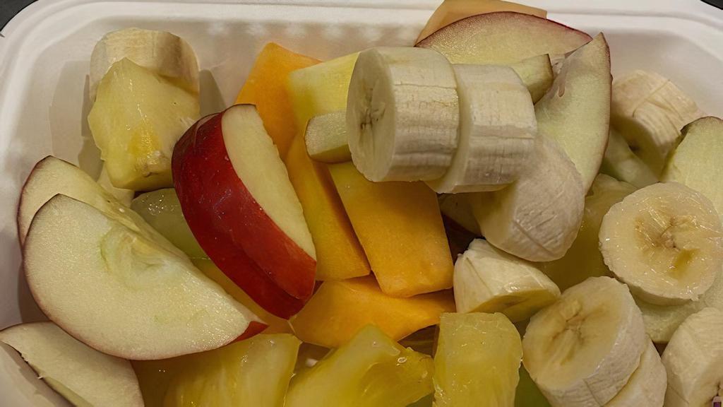 Fruit Bowl · A Large side of Melon, Cantaloupe, Pineapple, Strawberries, apples, and bananas.