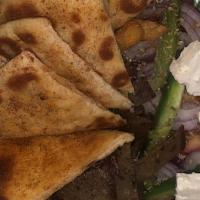 Greek Gyro Platter · Gyro meat, pita bread, french fries, red onions, tomatoes, and tzatziki cucumber sauce.