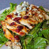 Grilled Chicken Spinach Salad · Chicken breast, spinach, cranberries, tomatoes, bleu cheese crumbles and toasted almond slic...