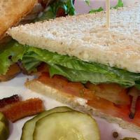 BLT · Bacon, lettuce, tomato, and mayonnaise on toasted white bread.