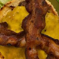 Bacon Cheeseburger · Half a pound of 100% certified angus beef. Topped with Two slices of applewood bacon. Includ...