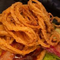 Cowboy Burger · Cheddar cheese bacon, onion straws and BBQ sauce.
Western style burger. 100% certified angus...