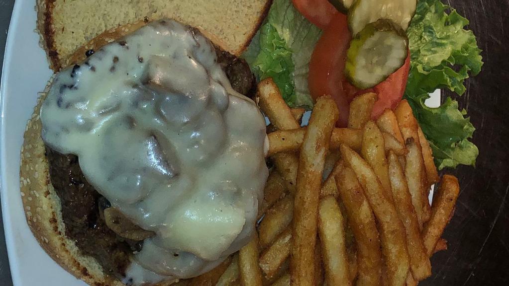 Mushroom Burger · Half pound certified 100% angus beef. Topped Sauteed mushrooms and melted jack cheese.