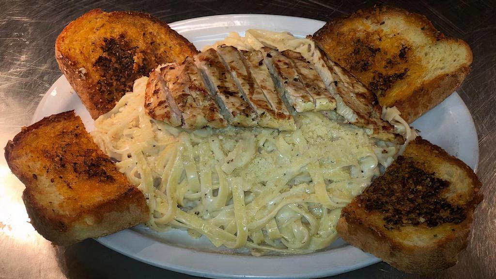 Fettuccine Alfredo · Add chicken breast for an additional charge.
