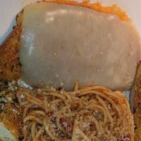 Chicken Parmesan · Breaded chicken breast topped with melted cheese and marinara sauce served with spaghetti ma...