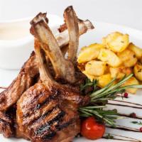 Lamb Shop Plate  · Baby rack of lamb with cumin, garlic, and rosemary. Cooked to perfection!