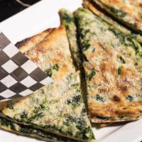 Spinach Naan · Naan stuffed with fresh chopped spinach.