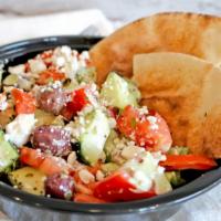Greek Salad  · Tomatoes ,cucumbers ,red onions, green bell peppers feta cheese, oregano & olives.