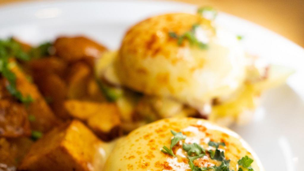 GNG Bacon Benedict · 2 poached eggs, beef bacon, avocados , on english muffin and topped with hollandaise sauce.