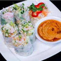 02 - FRESH ROLLS · Lettuce, cucumber, carrot, cabbage, and mixed green salad wrapped in rice paper. Served with...