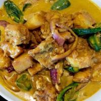 THAI YELLOW CURRY SAUCE · Thaibodia wet sauce style with your choice of chicken breast, wings, or fish (rock cod). Dee...
