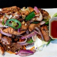 B4 BBQ - GARLIC BUTTER CHICKEN · Barbecued boneless chicken marinated in our special Thai honey sauce, tossed together with o...