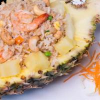 40 - PINEAPPLE FRIED RICE · Thai style fried rice with pineapple, minced garlic, yellow onion, roasted cashews, carrot, ...