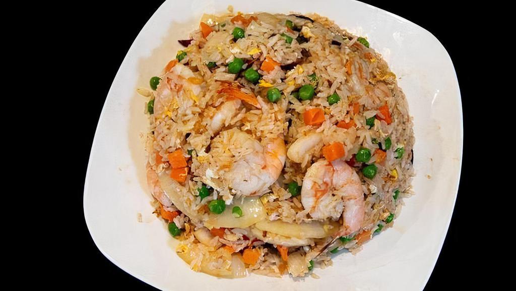 41 - HOUSE FRIED RICE · Thaibodia house style fried rice, with minced garlic, yellow onion, carrot, green peas, egg, and your choice of protein, tossed with Thaibodia house seasoning