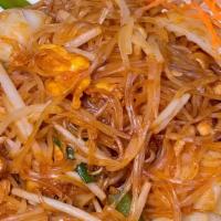 50 - PAD THAI · Fresh rice stick noodles stir-fried with tofu, egg, bean sprouts, and green onion. Served wi...