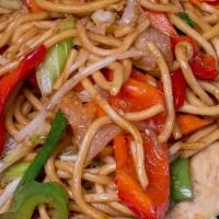 55 - BASIL CHOW MEIN · Egg noodles stir-fried with celery, cabbage, carrots, bell peppers, bean sprouts, yellow oni...