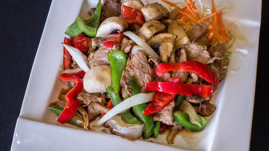 71 – ANGRY · Choice of protein sautéed with mushrooms, yellow onion, fresh basil leaves, bell pepper, Thai chili, minced garlic, green onion, and special chili sauce