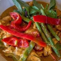 63 - PANANG CURRY · Panang curry paste simmered with coconut milk, fresh basil leaves, green beans, bell pepper,...