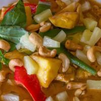 68 - PINEAPPLE CURRY · Red curry pastes simmered with coconut milk, pineapple, bamboo shoots, potato, fresh basil l...