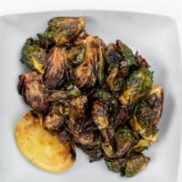 Crispy Brussel Sprouts · Vegetarian, gluten-free. Garlic, chilis, parsley, grilled lemon