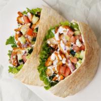 Chicken Souvlaki Pita Sandwich · Cubed charbroiled chicken on a pita with lettuce, tomato, onion, and your choice of sauce.