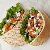 Chicken Kabob Pita · Marinated chicken breast with lettuce, tomatoes, cucumber, onions, and your choice of sauce ...