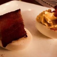 Deviled Eggs · Pickled jalapeno, crispy applewood bacon.
