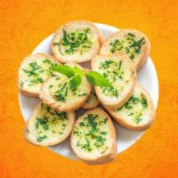 Garlic Loaded Bread · Italian bread topped with cheese to make a delightful offering.