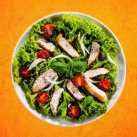 Chicken Caesar Salad · Fresh greens and veggies tossed with Caesers Dressing and topped with grilled chicken and cr...