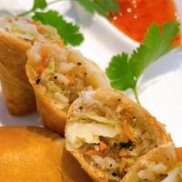 Vegetarian Rolls · Vegetarian rolls stuffed with silver noodle, carrots, and cabbage. Served with sweet and sou...