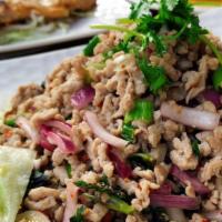 Larb · Choice of ground chicken, pork or beef. Cooked and seasoned with onions, mint leaves, roaste...