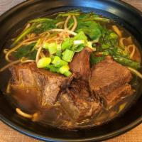 Stewed Beef Noodle Soup · Choice of noodles with stewed of premium chuck beef, seasonal green vegetable, and bean spro...