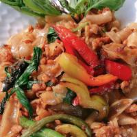 Pad Kee Mao · Stir fried flat rice noodles with green beans, bell peppers, Thai chili, and sweet basil.
