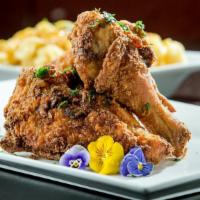 Jordan's Fried Chicken · Served with garlic mashed potatoes, seasoned with our house rub, includes a breast, thigh, d...