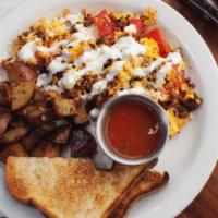 2 Egg Scrambles · Potatoes, toast, choice of; chicken and roasted tomatoes, brie and veggie or chorizo.