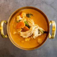 Red Curry · thai red curry with coconut milk, bamboo, bell peppers, and basil.