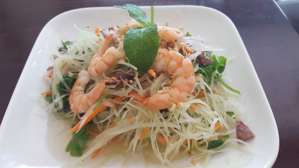 Gỏi / Green Papaya Salad · Wild shrimp, pork, carrots, mint, roasted peanuts, and fish sauce.