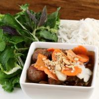 Bún Chả Thịt Nướng · Marinated grilled pork and meatballs. Served with rice vermicelli, fresh herbs, fish sauce, ...