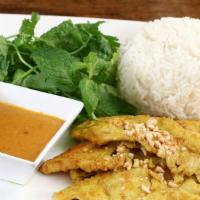 Gà Satay · Mary’s chicken satay, served with rice, fresh herbs, satay sauce and peanuts.