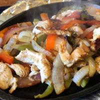 Sizzling Fajitas x1 · Fajita-marinated steak, chicken, prawns, or a combo, served sizzling with onions and bell pe...