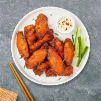 Cluckin' Wings · (6 pieces) Fresh chicken wings breaded and fried until golden brown.