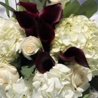SK009. Elegant Heart · Burgundy mini calla, white hydrangea, white roses, seeded.