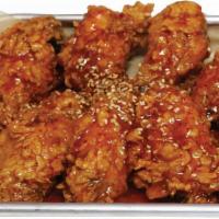 Spicy Chicken Wings · Deep fried wings tossed in spicy and tangy sauce. Honey/kill me sauce on our wings for an ad...