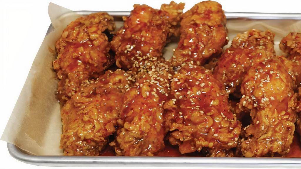 Spicy Chicken Wings · Deep fried wings tossed in spicy and tangy sauce. Honey/kill me sauce on our wings for an additional charge. (available non-spicy).