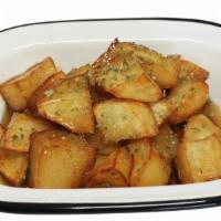 Glazed Potato · Deep fried potatoes in sweet soy glaze.