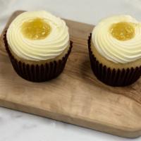 Set of 2 Golden Pineapple Cupcake · Two pieces. Set of 2 Vanilla cupcake with pineapple filling, topped with cream cheese frosti...