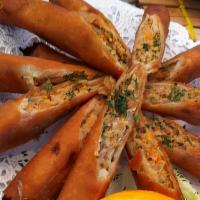 Lumpiang Shanghai (12) · Deep-fried homemade spring rolls stuffed with sautéed ground pork, shrimps, and mixed ingred...