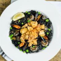 Seafood Black Rice · Good for three people. Our signature black fried rice with shrimps, scallops,
snow crab meat...